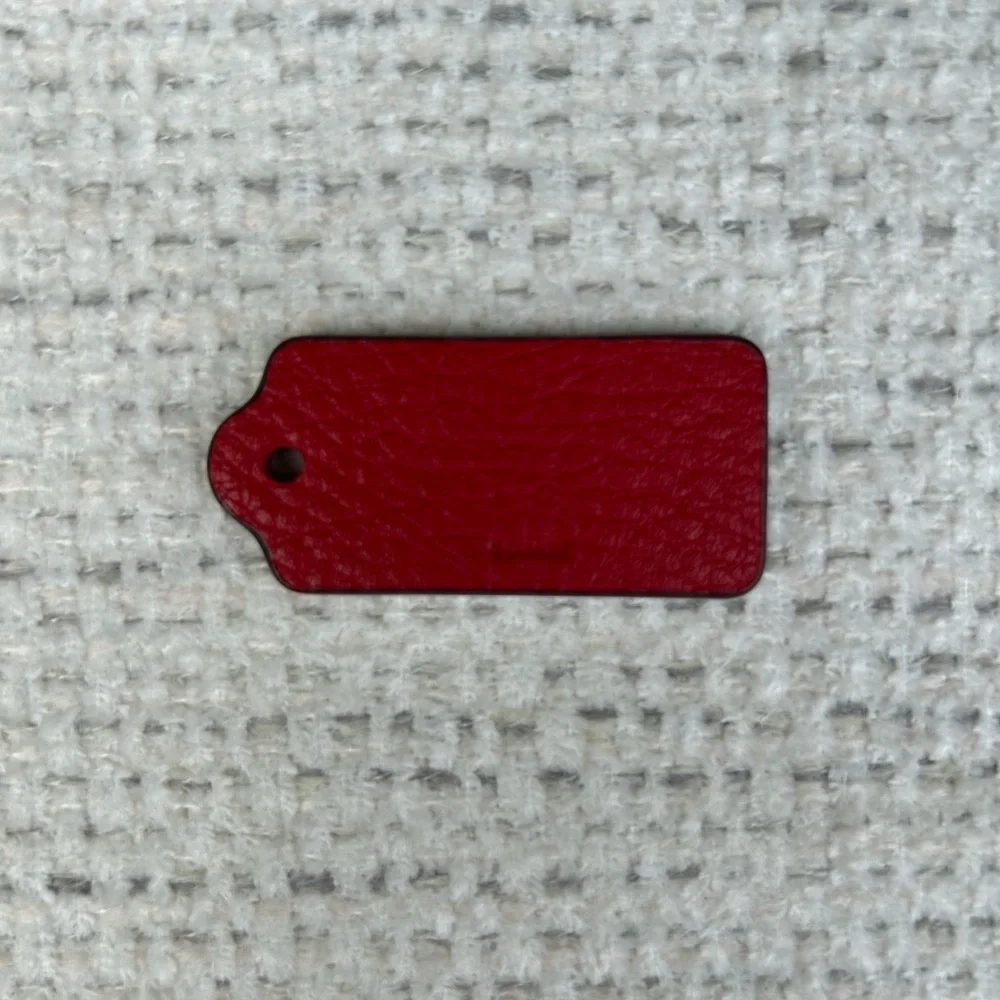 Coach inch tag